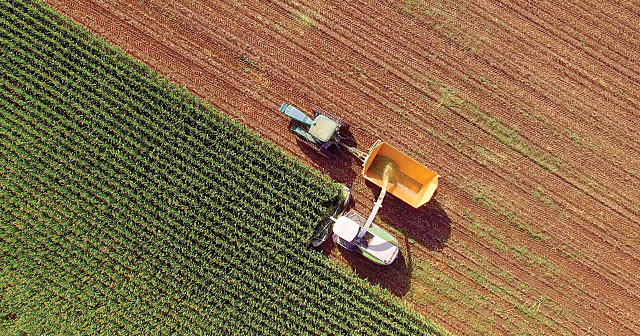 tractor harvesting aerial