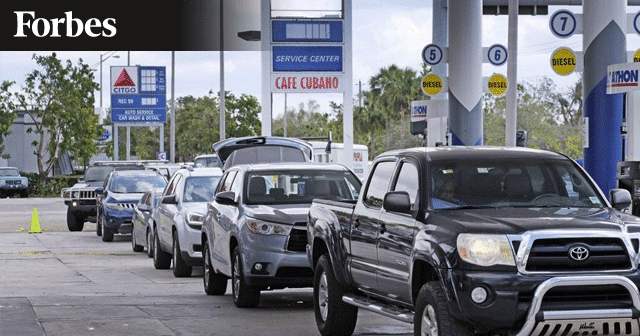 News Insights Cars at Gas Station